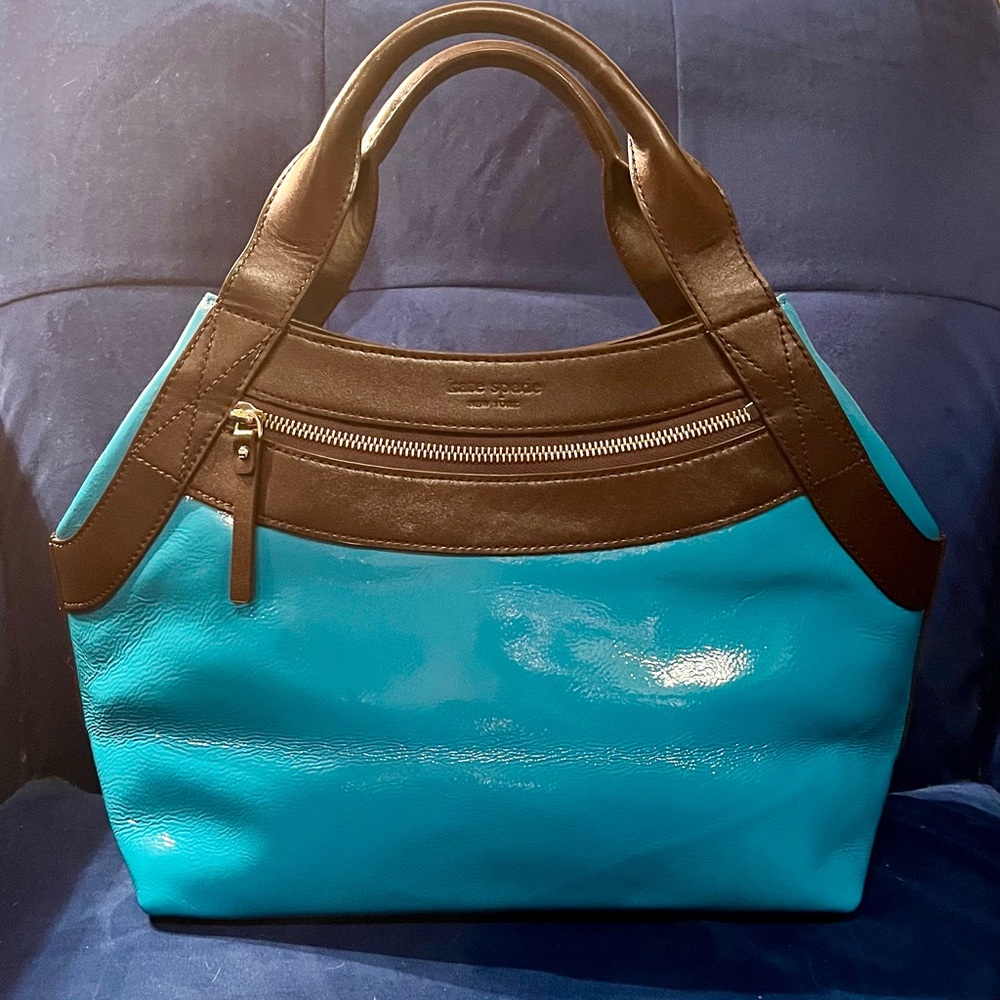 Kate Spade turquoise/teal patent leather bag with dark brown accents and straps